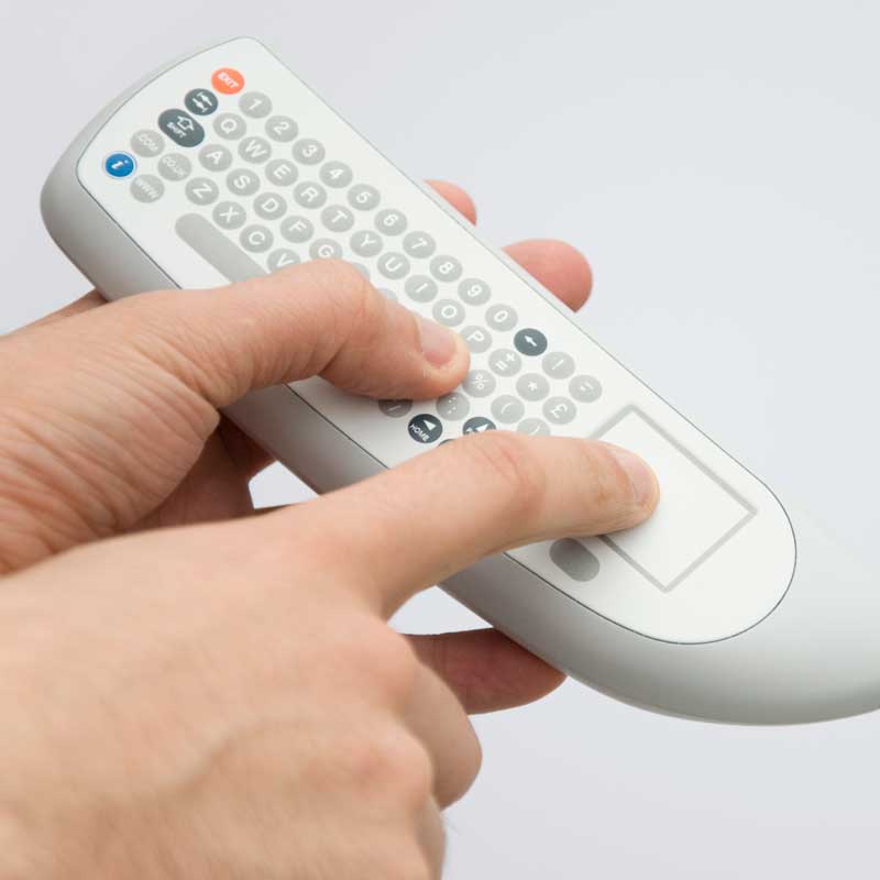 Patient entertainment terminal handset with touch pad